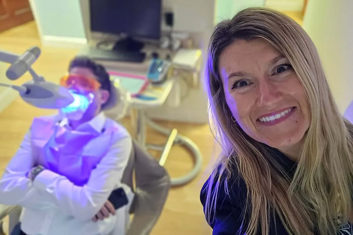 Dr. Flori Arhiri with a dental patient